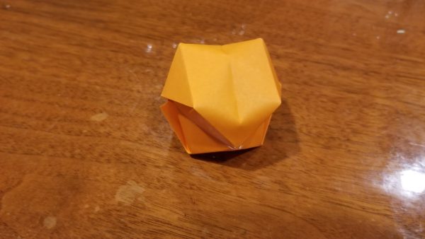 orange origami ball, inflated